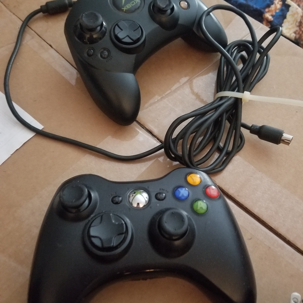 2 Controllers Wireless Xbox 360 & a wired Original X Box with Colored Buttons.